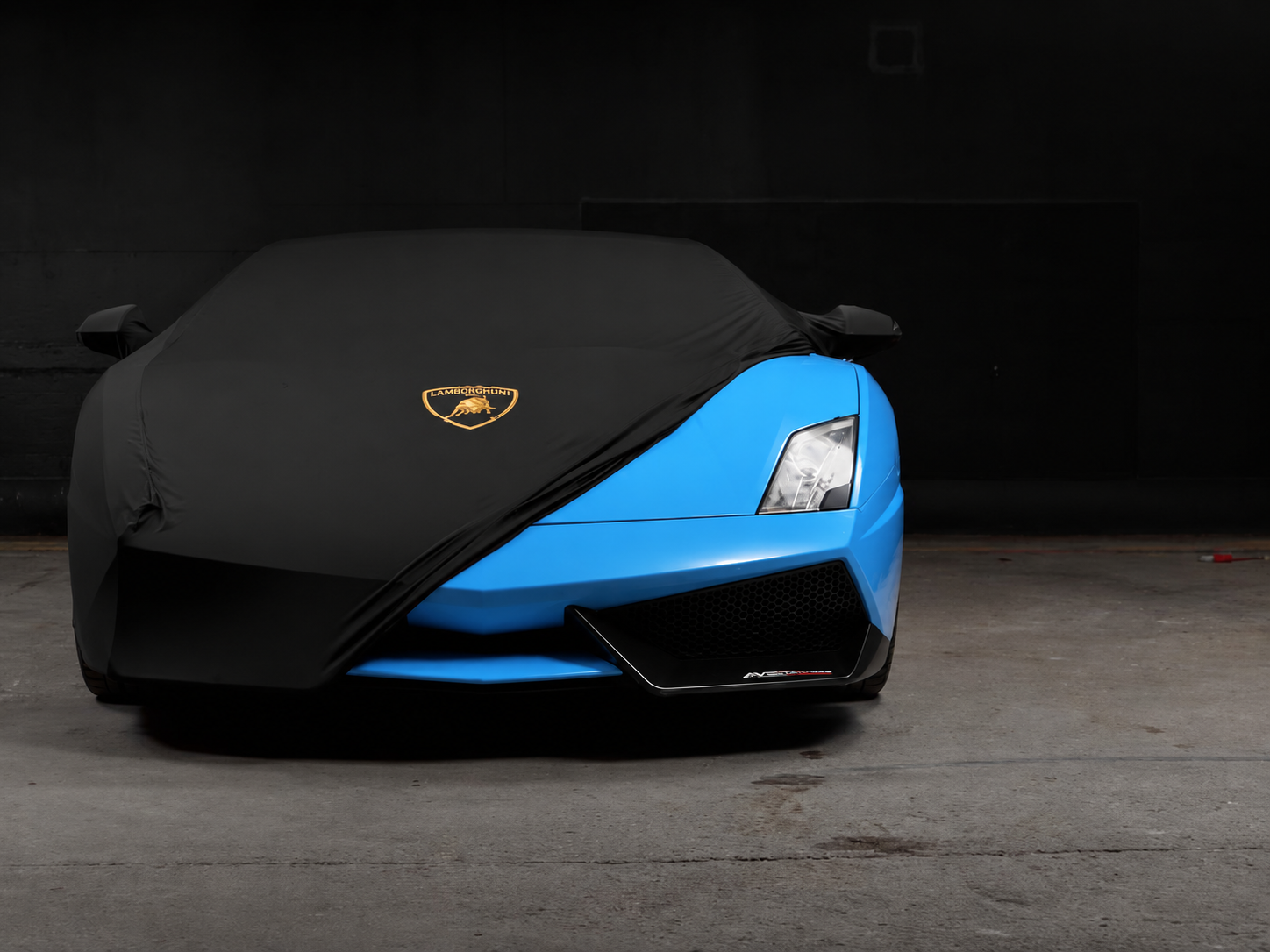 Blue Lamborghini being unveiled